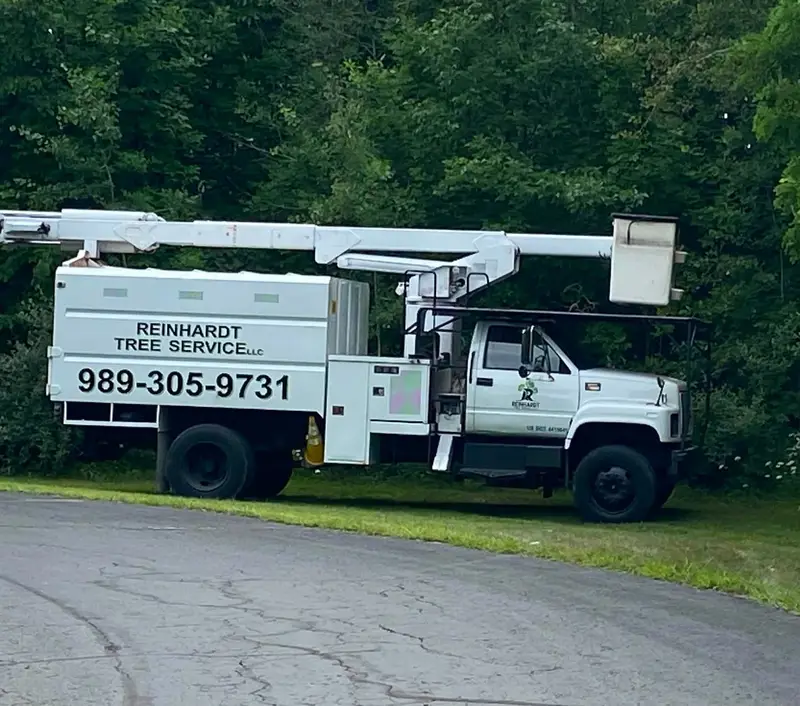 Bucket truck: forestry chip body and aerial lift