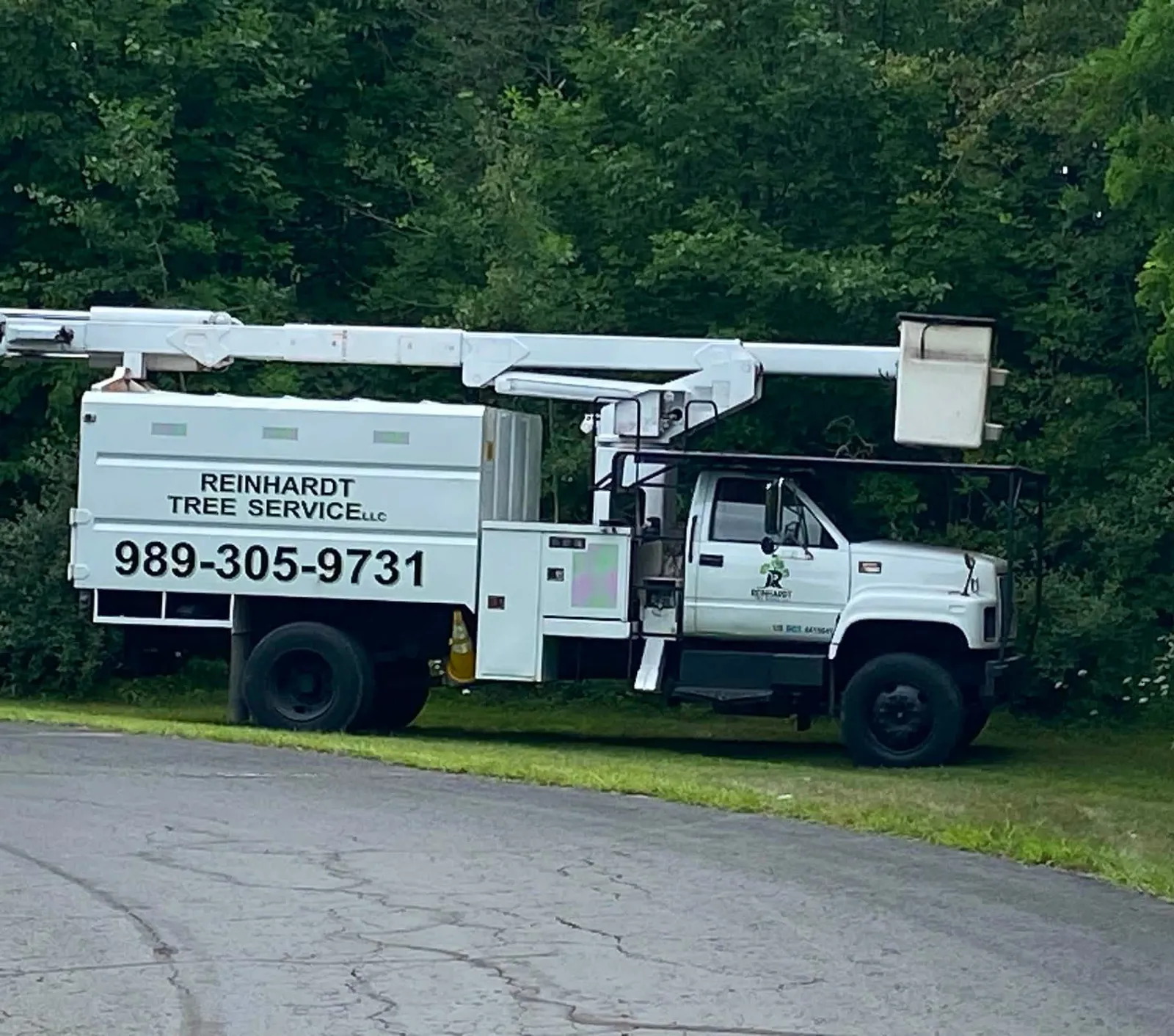 Bucket truck: forestry chip body and aerial lift